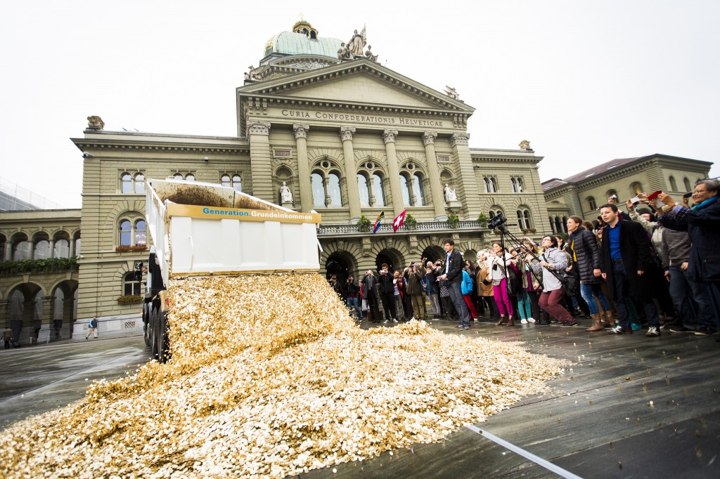 Performance by the initiators of the referendum, who dumped 8 million coins at a square when they reached the necessary number of 125,000 signatures to call the referendum. Source: Wikipedia,